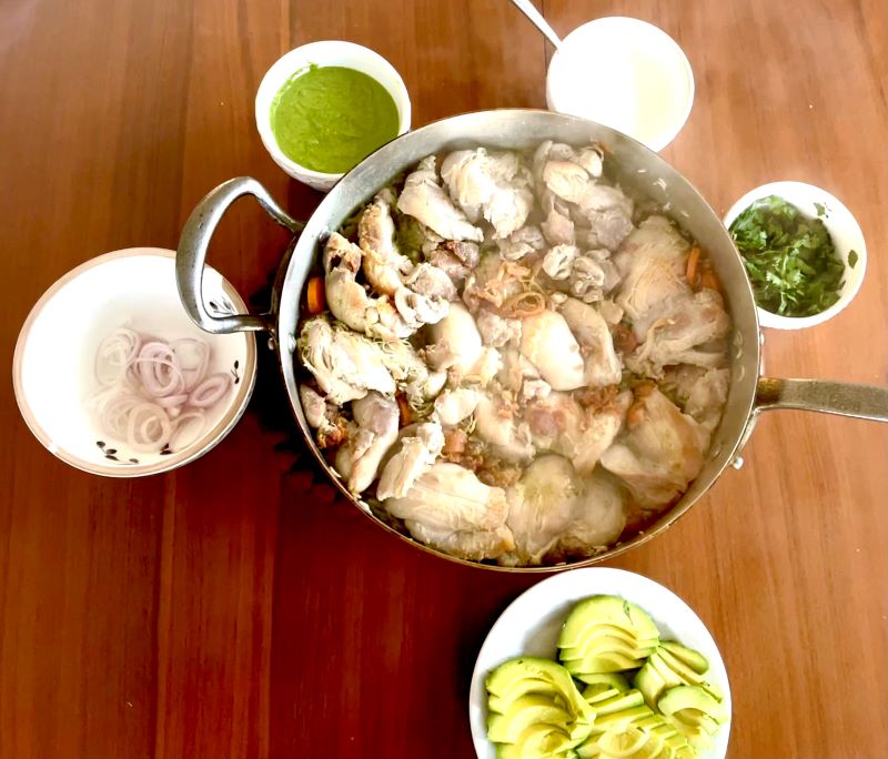 Peruvian green chicken with all the sauces and toppings